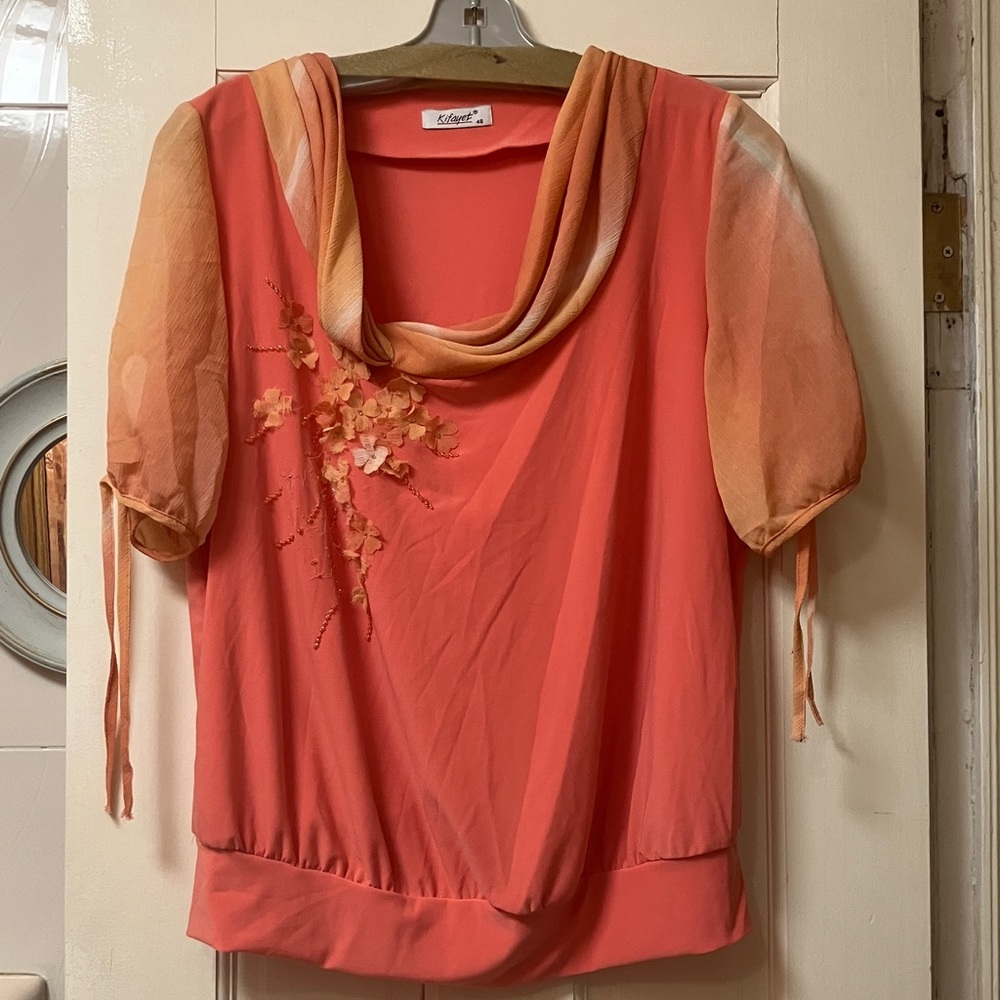 Kifayet Coral Blouse with Floral Accent and draped front neckline,46( fits M-XL)